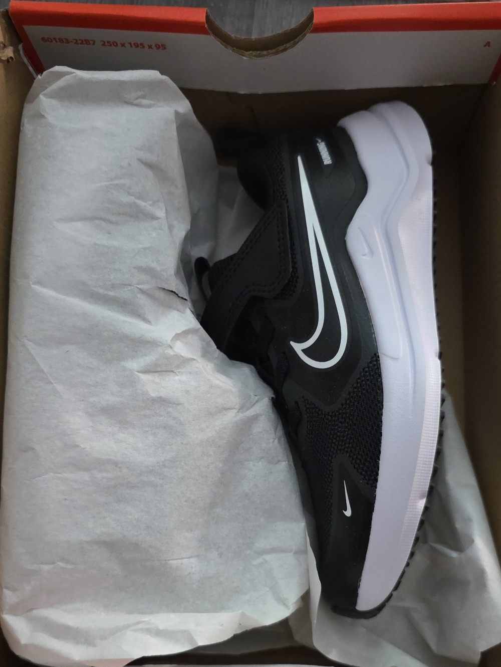 Nike Black and White Youth Athletic Sneaker